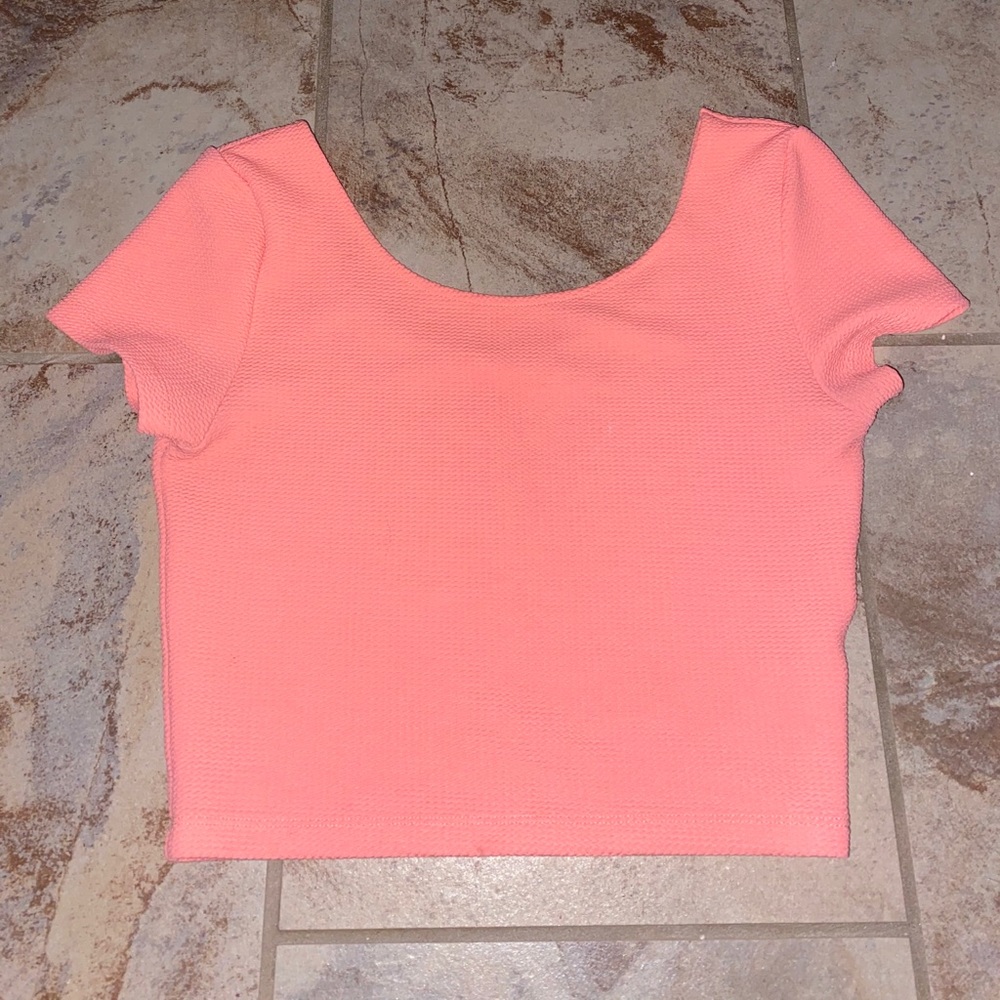 Short bright pink top